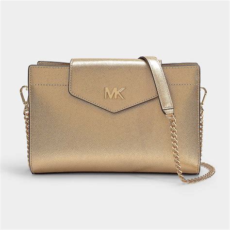 michael kors tote gold buttons|Michael Kors gold crossbody bag.